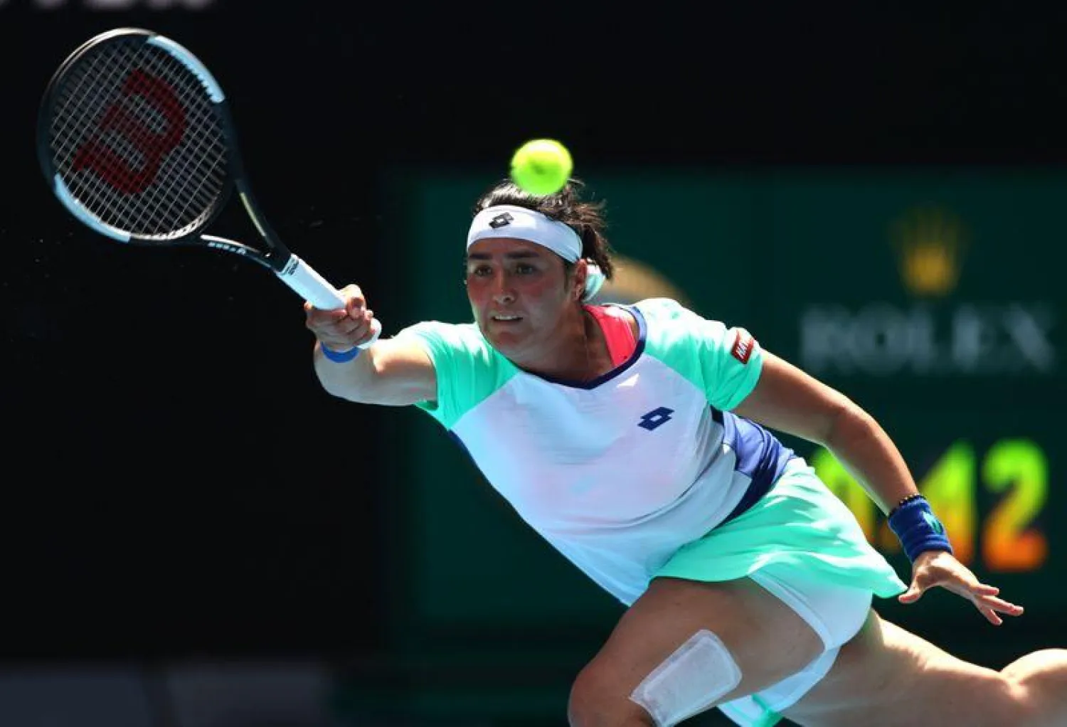 FILE PHOTO: Tunisia's Ons Jabeur in action during her Australian Open quarter final match against Sofia Kenin of the US in Melbourne, Australia, Jan. 28, 2020. REUTERS/Kai Pfaffenbach