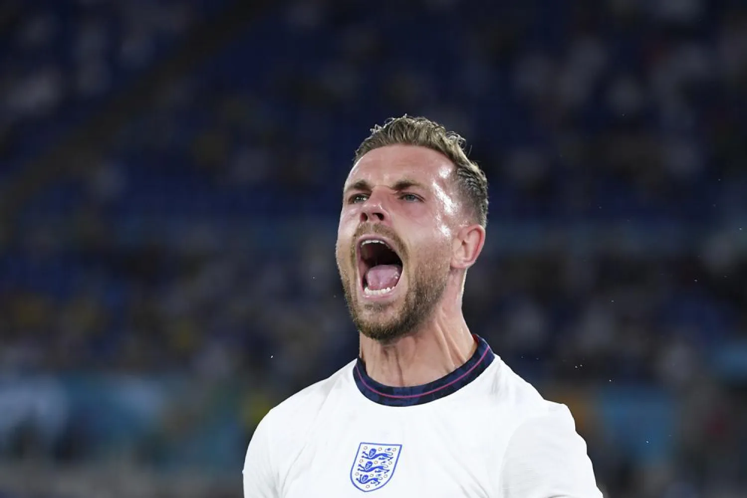 England’s Jordan Henderson celebrates after scoring his side’s fourth goal during the Euro 2020 quarterfinal match against Ukraine at the Olympic stadium in Rome, Saturday, July 3, 2021. (AP)
