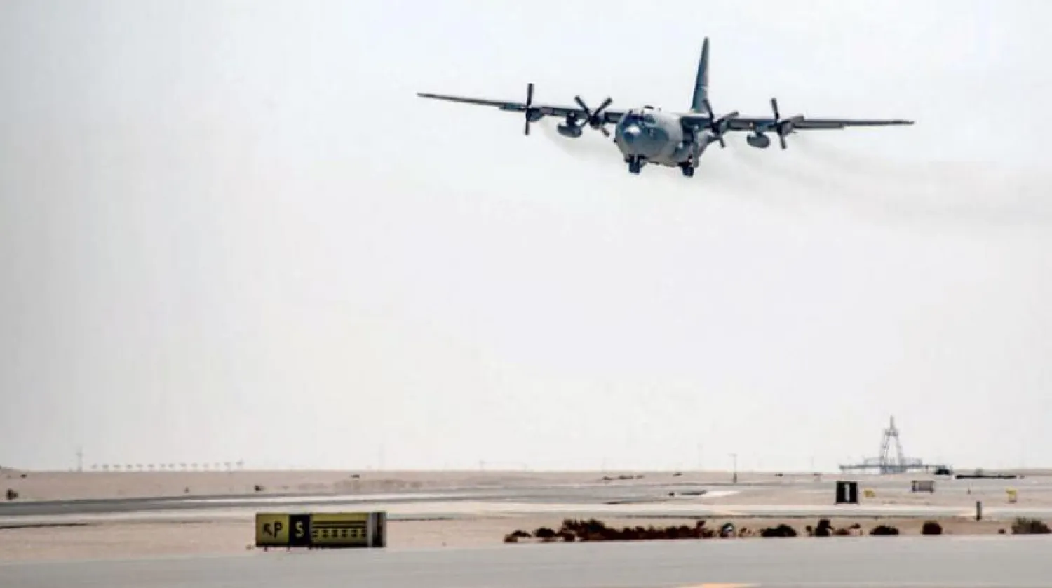 A Lockheed C-130 Hercules expeditionary aircraft lands on the runway at Al Udeid Air Base, Qatar, February 13, 2021 (CENTCOM) 