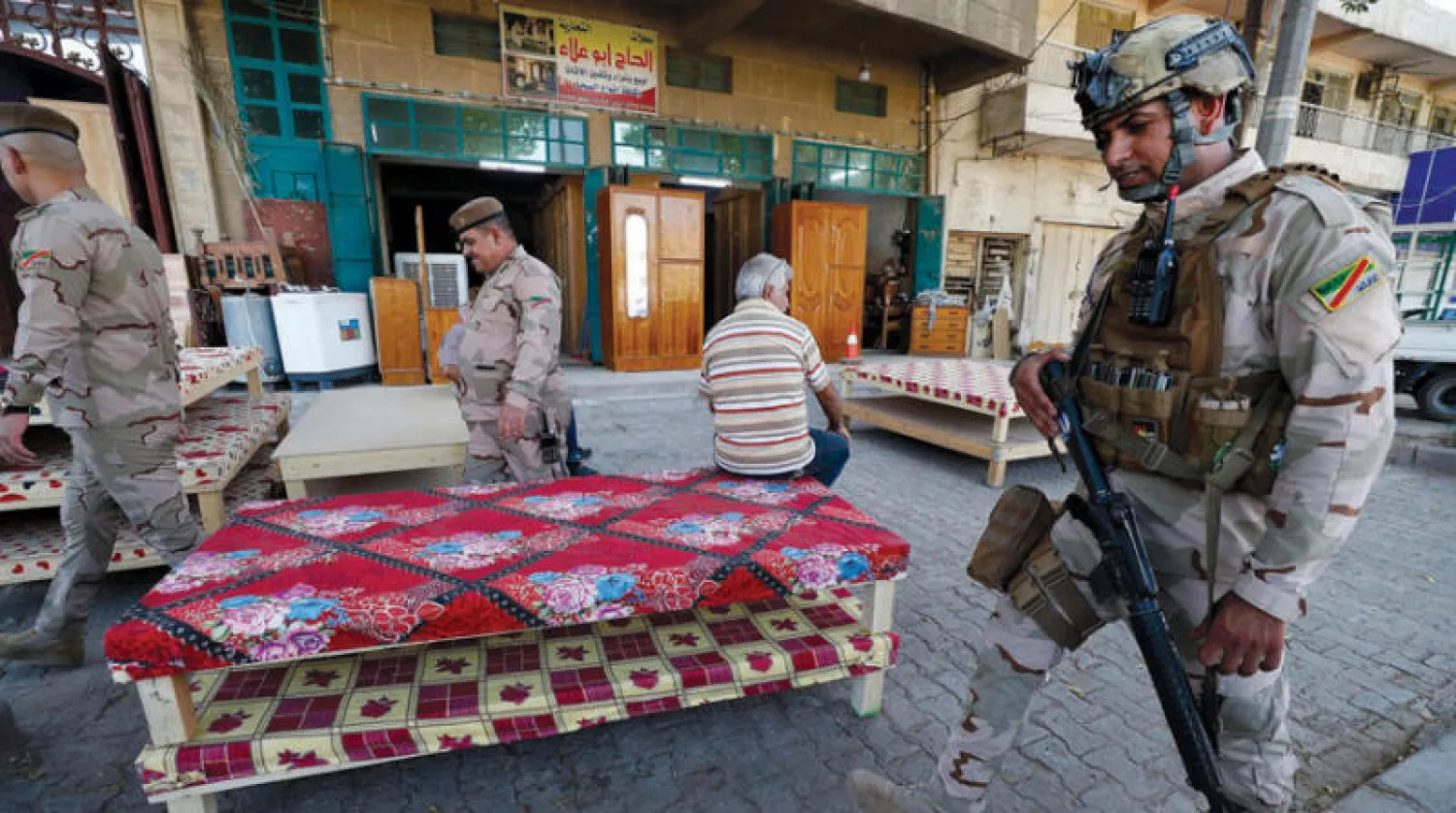 جنود عراقيون بمنطقة الصليخ شرق بغداد أول من أمس (أ.ف.ب)