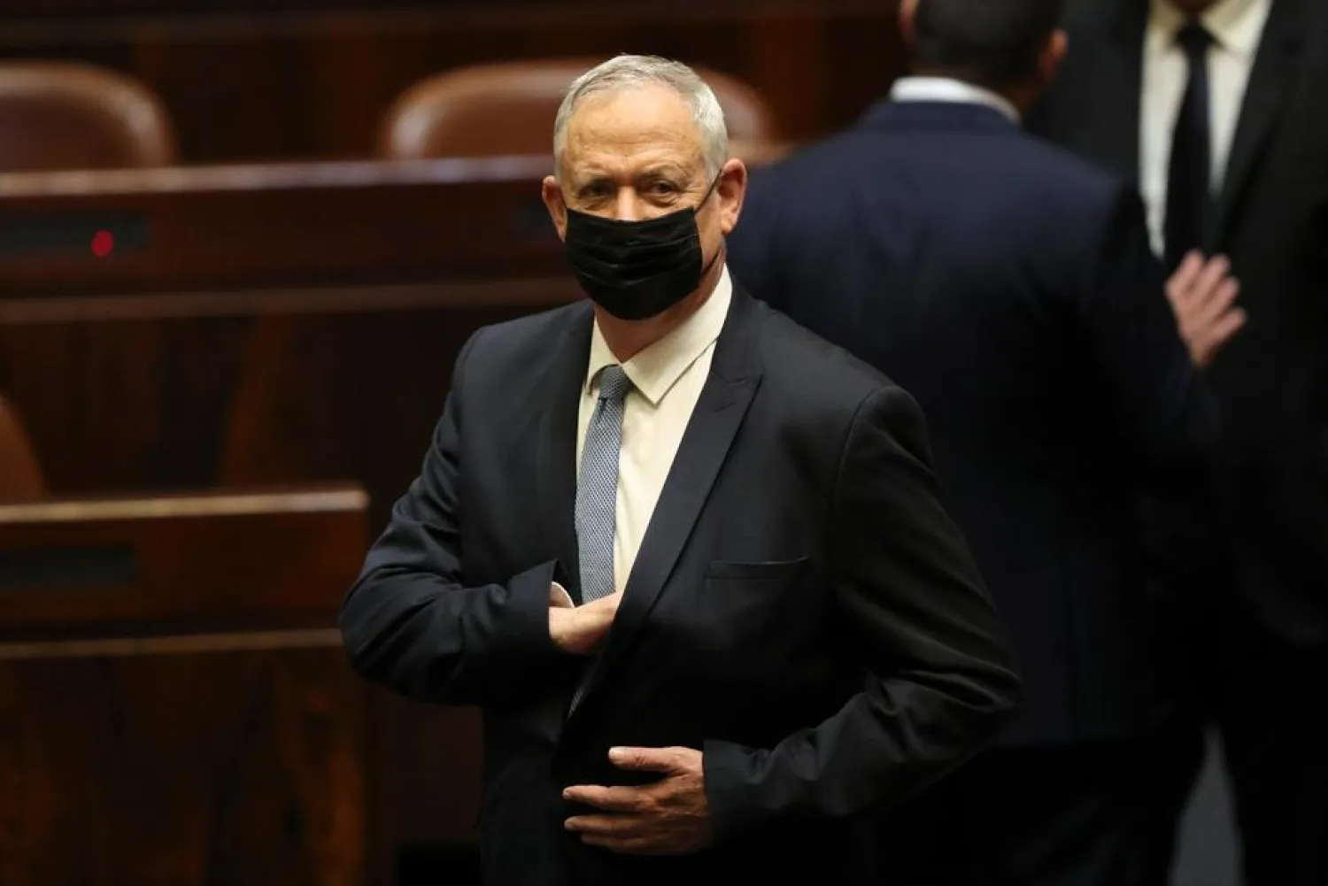 FILE - In this Sunday, June 13, 2021, file photo, Israeli politician Benny Gantz stands during a Knesset session in Jerusalem.  (AP Photo/Ariel Schalit, File) THE ASSOCIATED PRESS

