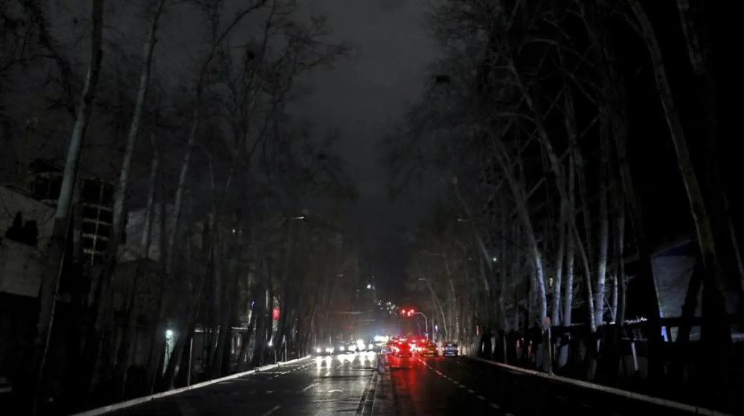 Cars drive on an unlit street during a blackout in Tehran, Iran, Wednesday, Jan 20, 2021. Speculation has gripped social media in Iran that Bitcoin is to blame for a series of recent power blackouts across the country. The government launched a major crackdown on Bitcoin processing centers which use immense amounts of electricity and are a huge burden on the power grid. (AP Photo/Ebrahim Noroozi)

