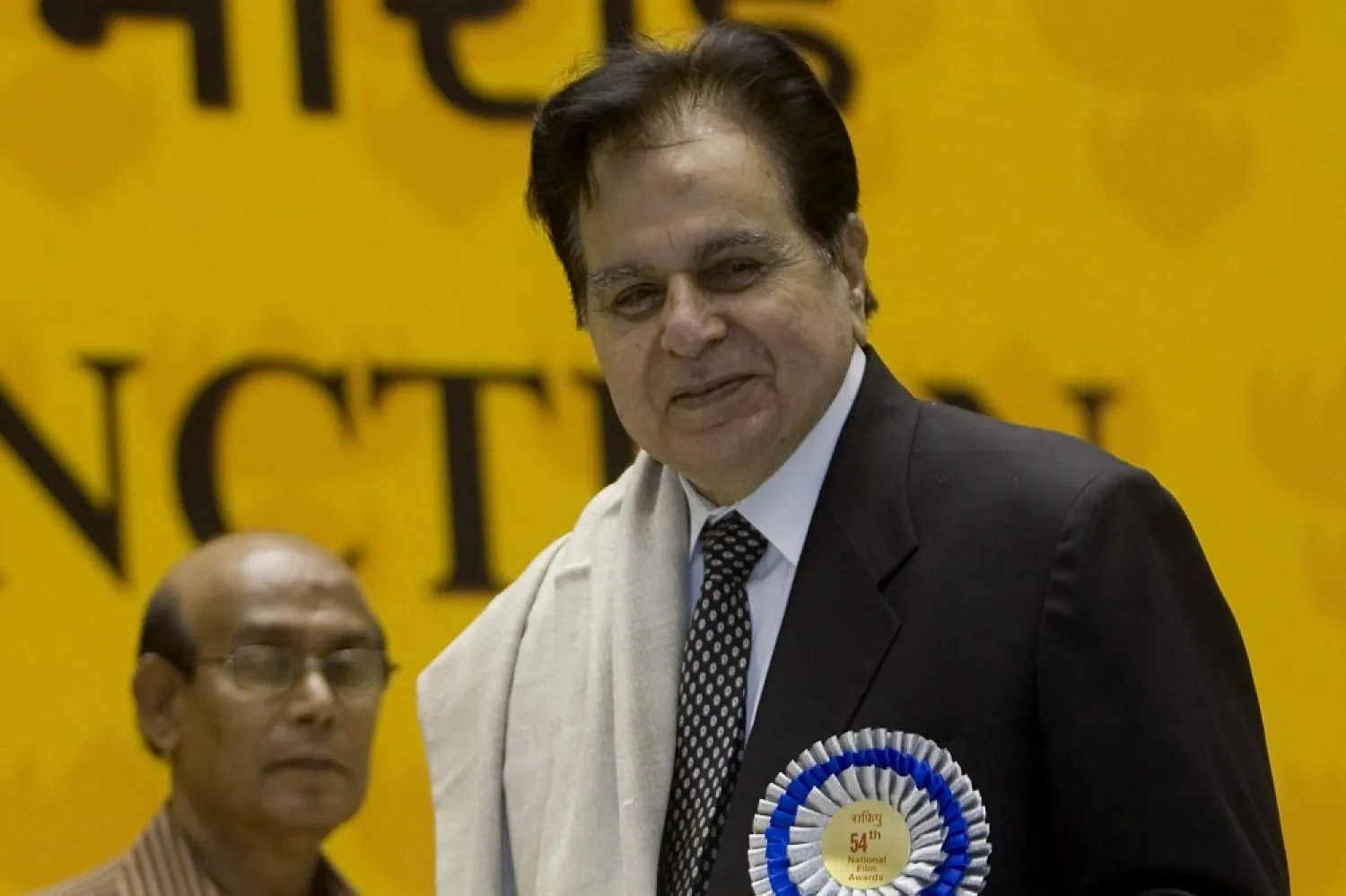 In this Sept. 2, 2008, file photo, veteran Bollywood actor Dilip Kumar, right, receives a Lifetime Achievement award at the 54th National Film Award ceremony in New Delhi, India. (AP)