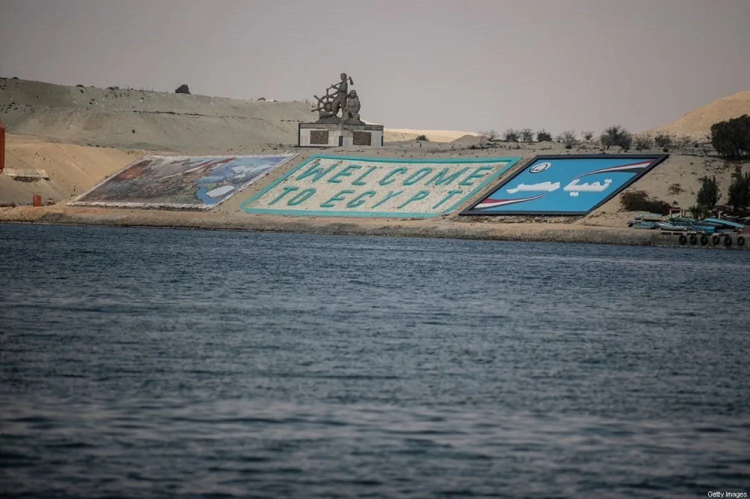 A “Welcome to Egypt” sign can be seen across the Suez Canal on March 30, 2021 in Ismailia, Egypt. (Getty Images)