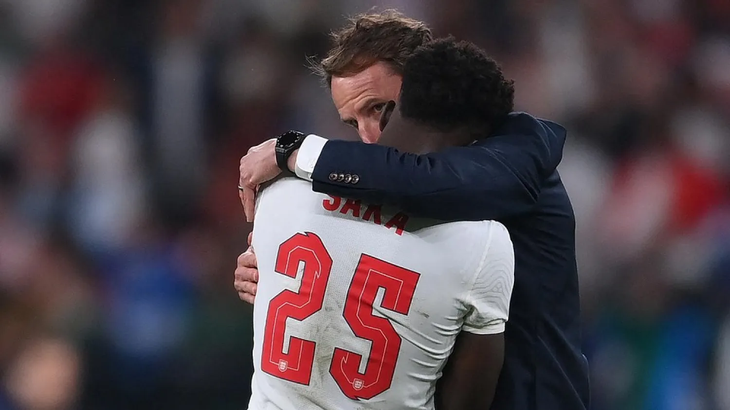 Gareth Southgate consoles Bukayo Saka, who missed England’s final penalty in the shootout. (AFP)
