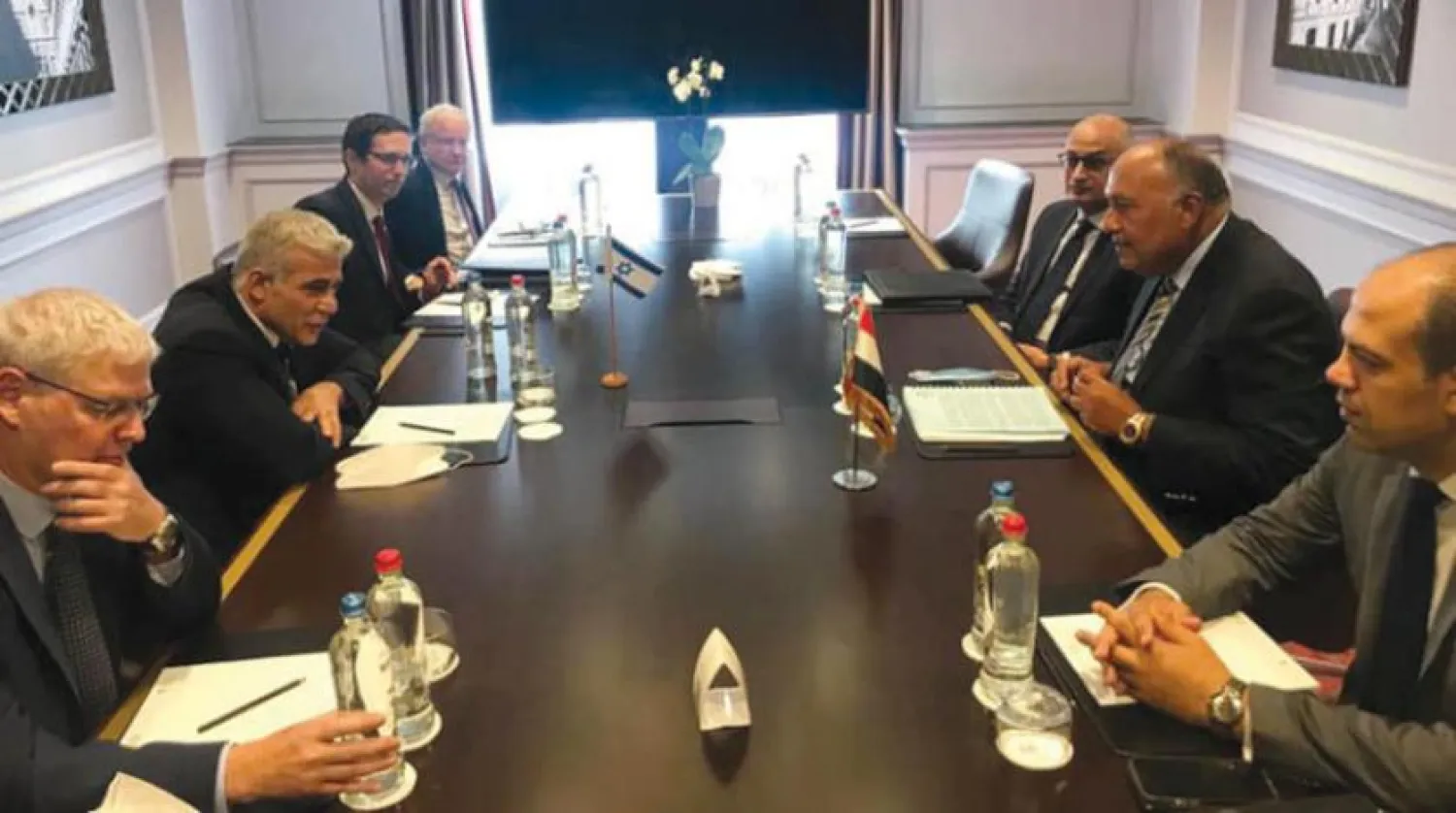 Egyptian Foreign Minister Sameh Shoukry meets with his Israeli counterpart Yair Lapid in Brussels. (Egyptian Foreign Ministry)