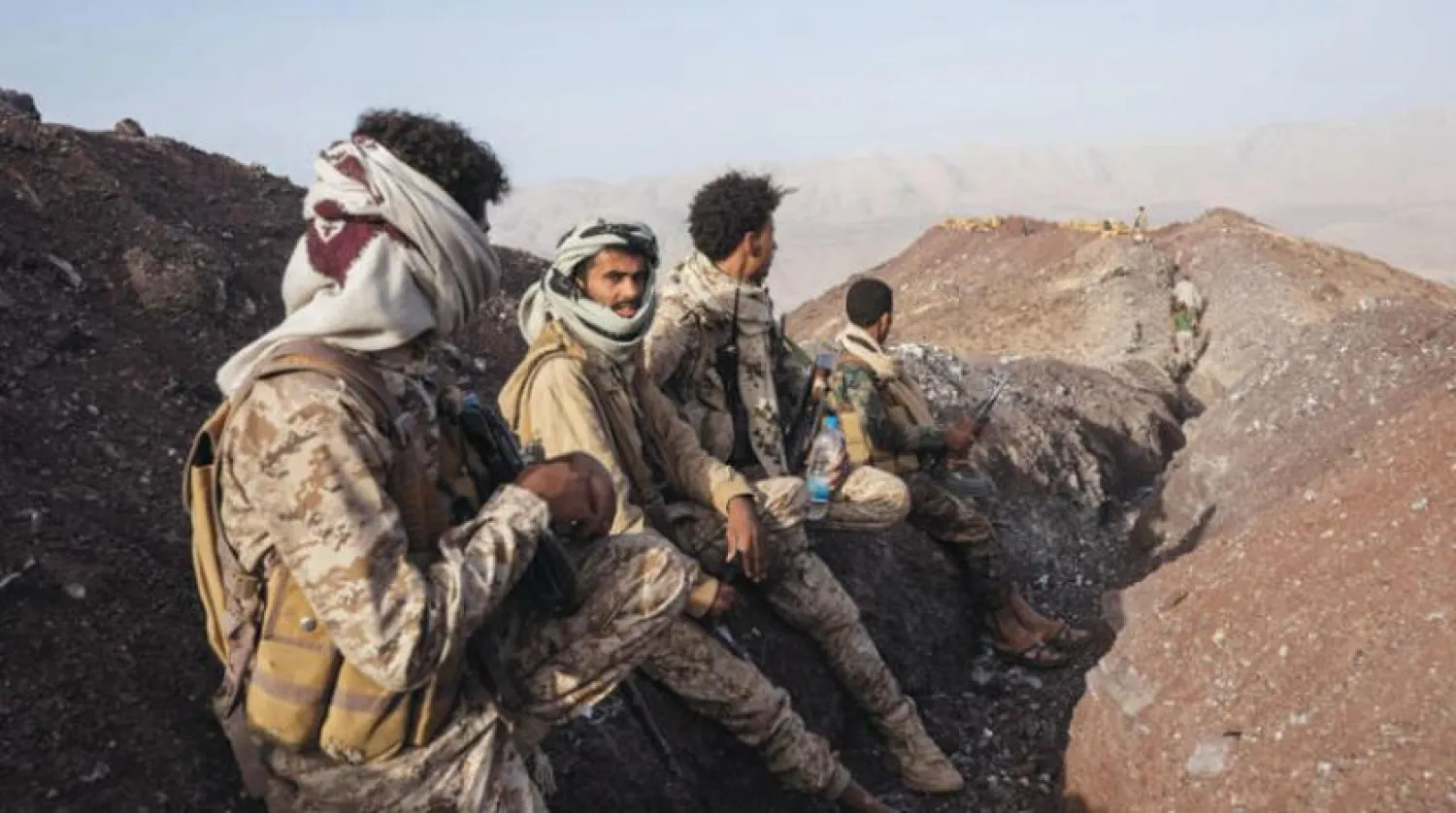 Pro-government fighters during battles with Houthi militias on the outskirts of Yemen’s northeastern governorate of Marib. (AP)