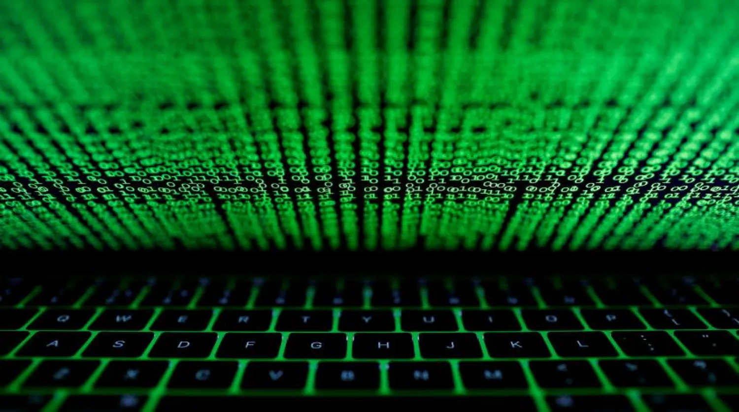A computer keyboard lit by a displayed cyber code is seen in this illustration picture taken on March 1, 2017. REUTERS/Kacper Pempel/Illustration
