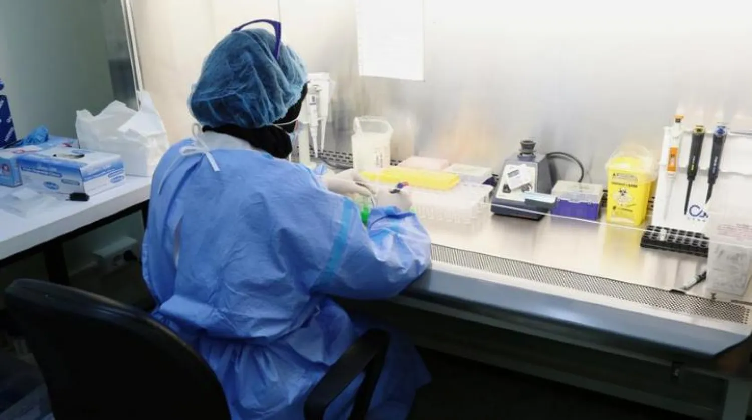 A medical staff works inside a lab for analyzing the coronavirus disease (COVID-19) tests, at Rafik Hariri University Hospital, in Beirut, Lebanon October 1, 2020. REUTERS/Issam Abdallah