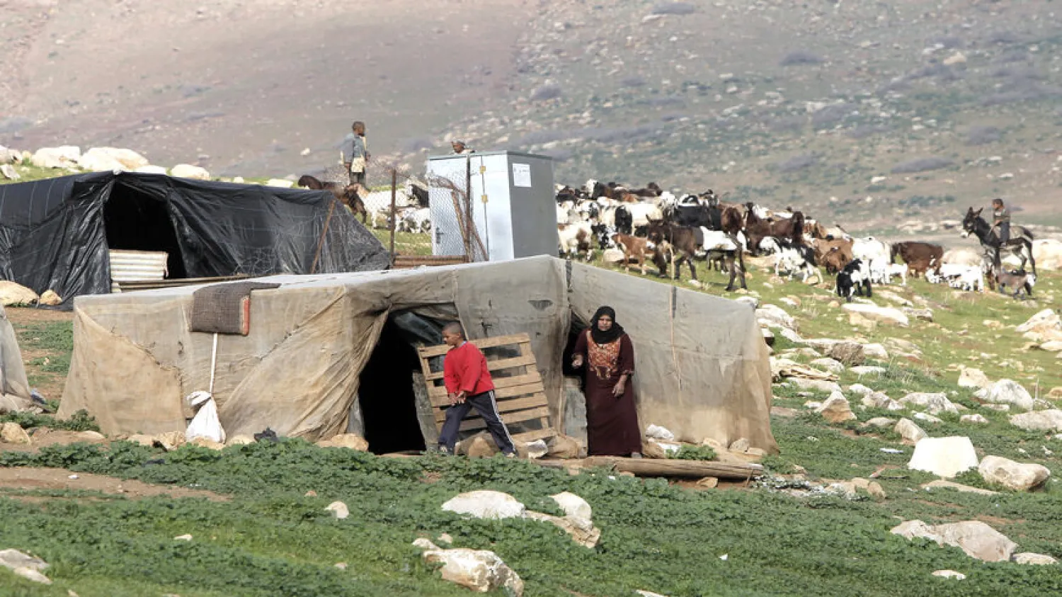  Palestinian Bedouins prepare to evacuate as the Israeli army readies to carry out military exercises in the Wadi al-Maleh area, in the north of the Jordan Valley, West Bank, Jan. 2, 2013. - Ahmad Gharabli/AFP via Getty Images
