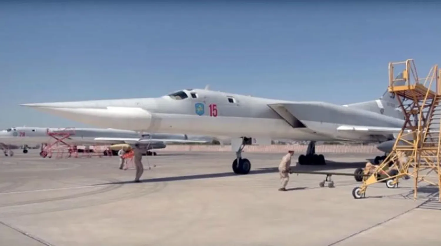 Russian soldiers near a MiG-31K aircraft in Hmeimim base in western Syria carrying (Russia Today)
