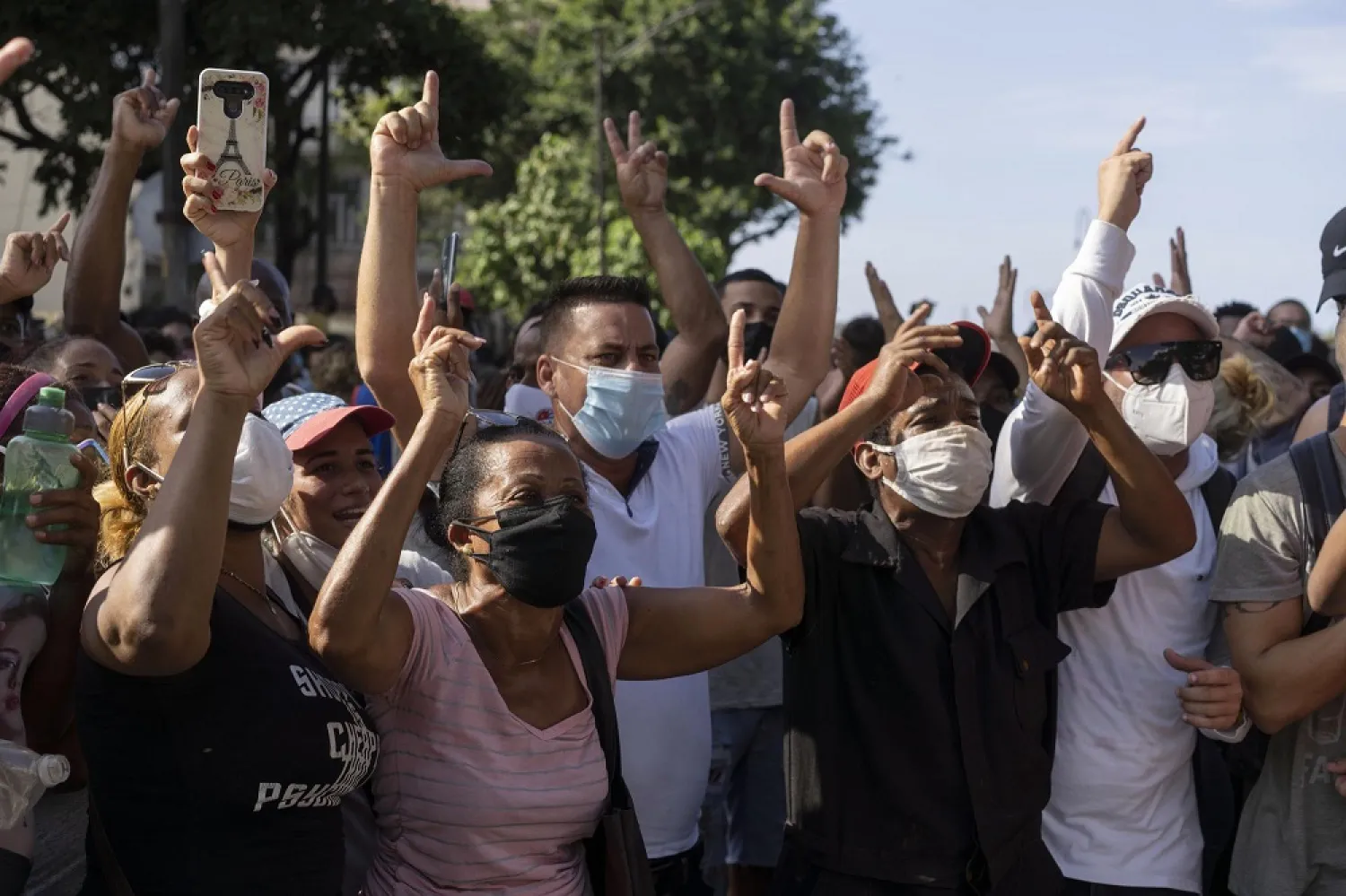 Anti-government protesters march in Havana, Cuba, Sunday, July 11, 2021. (AP)