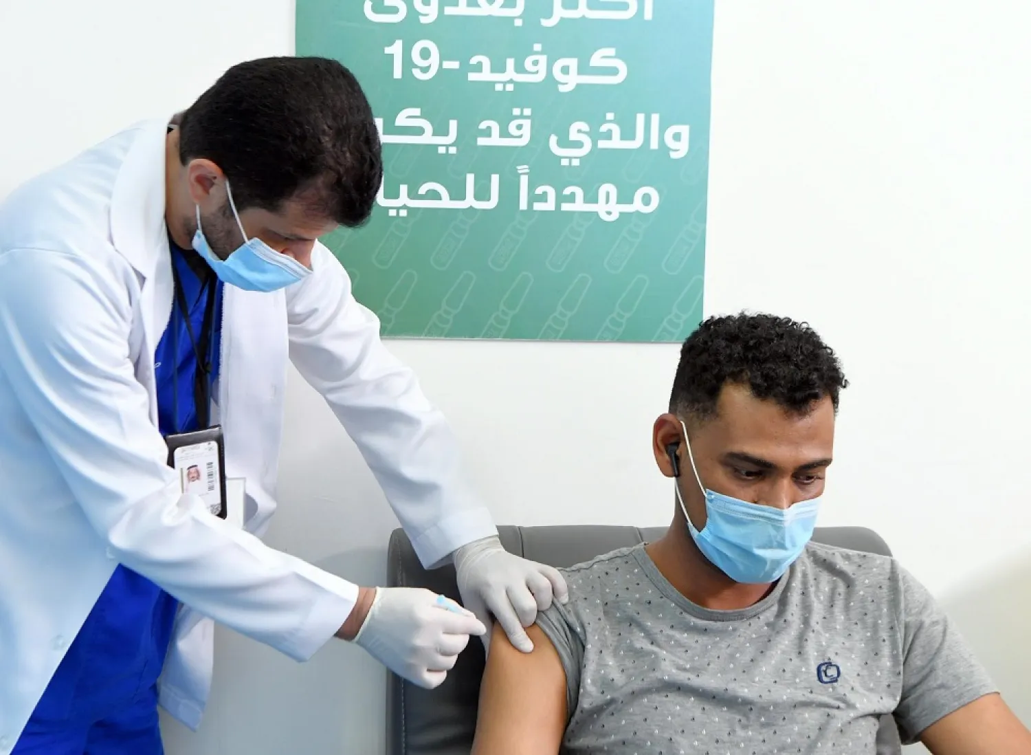 A man receives a coronavirus vaccine shot in Saudi Arabia. (SPA)