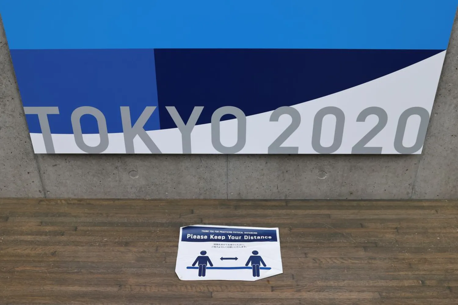 A reminder for social distancing is seen at the Tokyo 2020 Olympic Games Main Press Center during the coronavirus disease (COVID-19) outbreak in Tokyo, Japan, July 16, 2021. (Reuters)