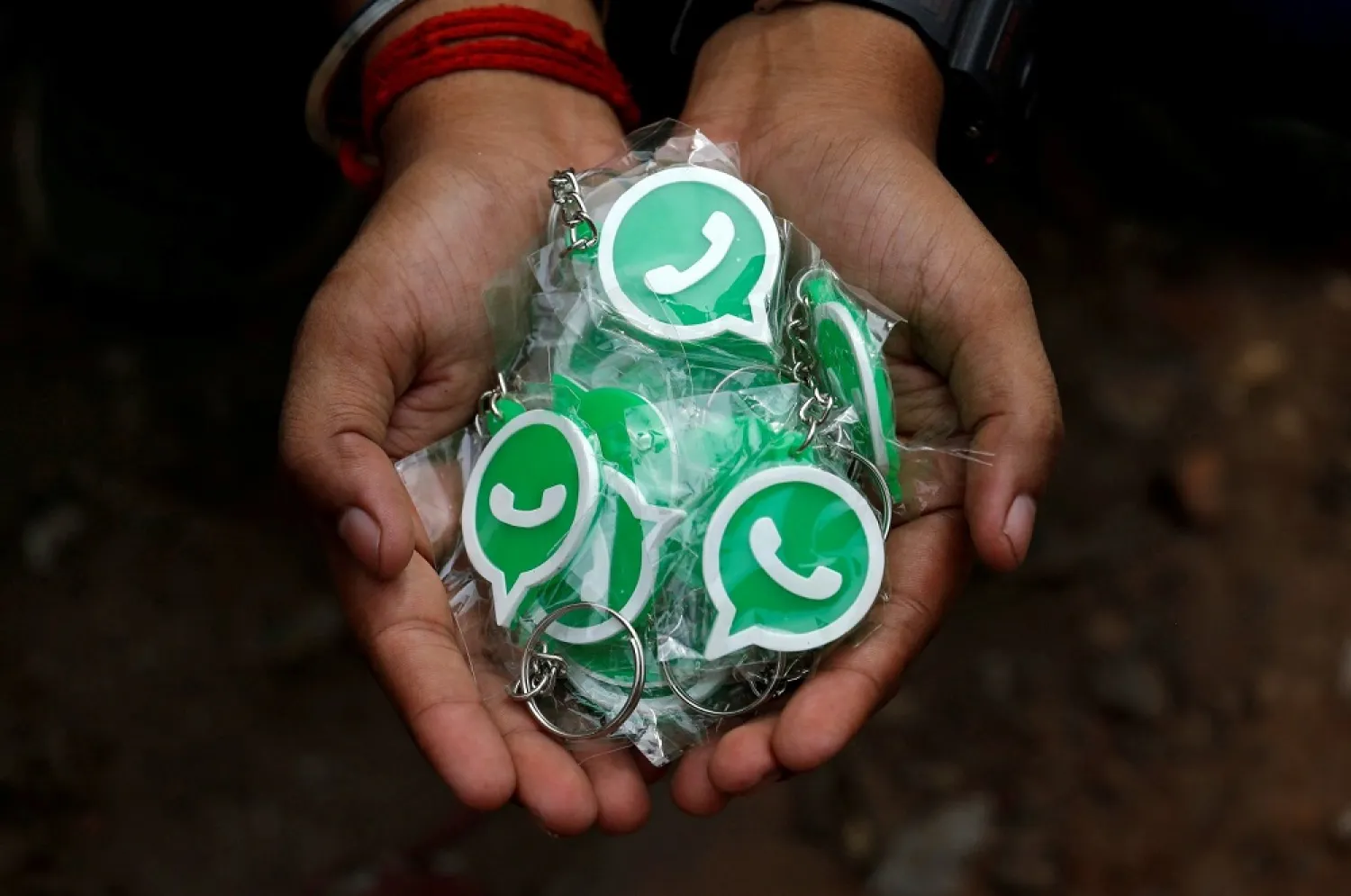 Key chains with the logo of WhatsApp, Kolkata, India, Oct. 9, 2018. (Reuters)