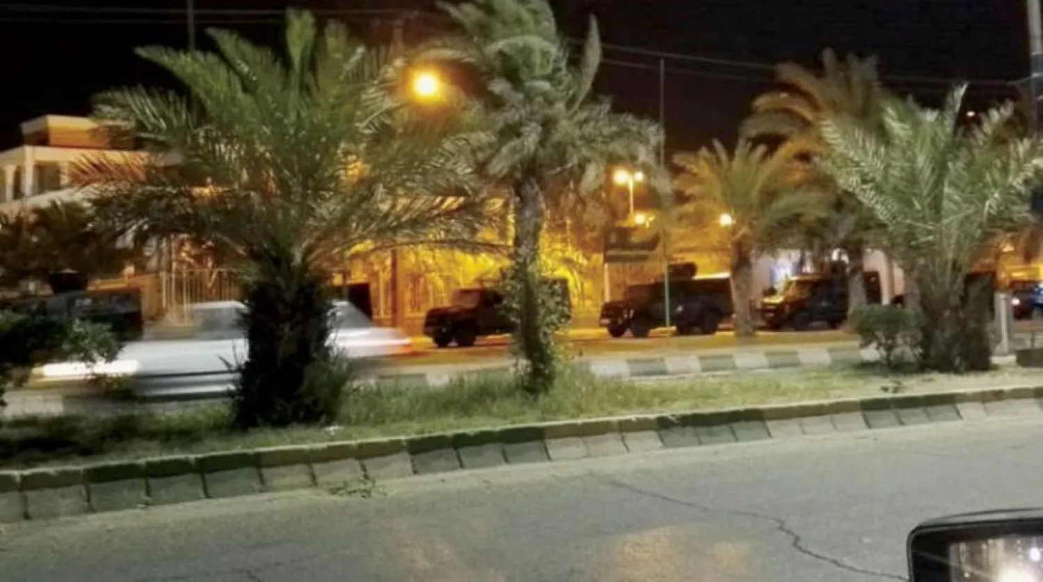 Riot police vehicles deployed at the entrance to the city of Susangerd on Sunday night, according to a photo taken by an activist.