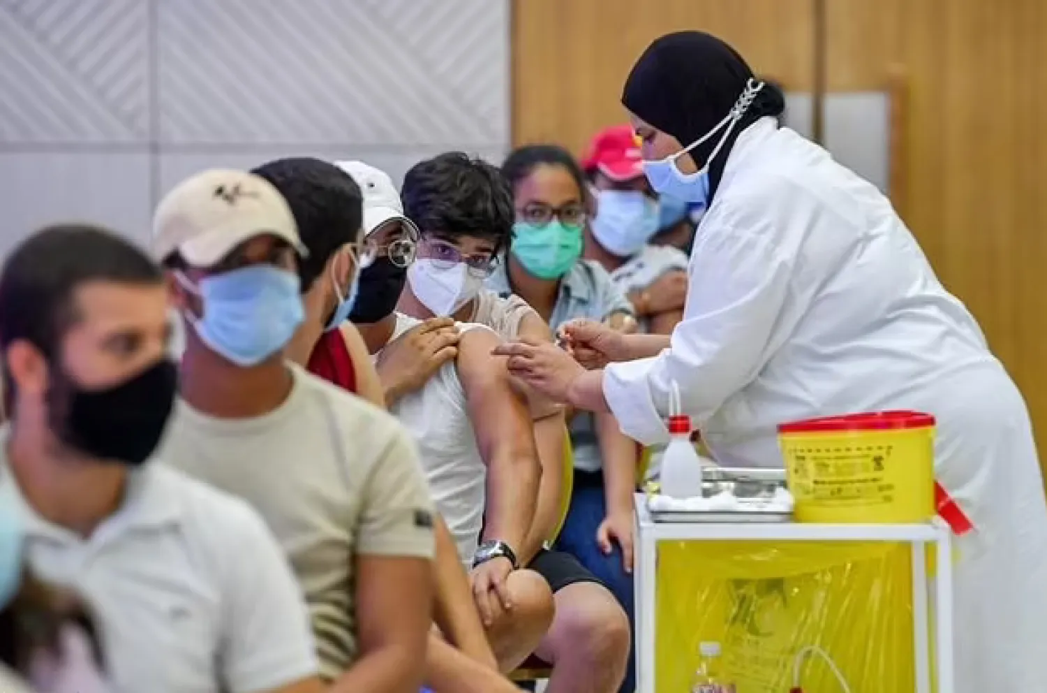A vaccine drive marking the Eid al-Adha festival sparked a rush at inocculation centers - AFP