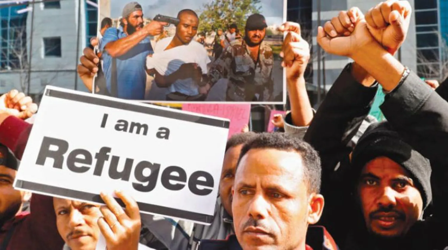 File photo of a demonstration of asylum seekers in Israel against their deportation to Uganda and Rwanda (Getty Images) 