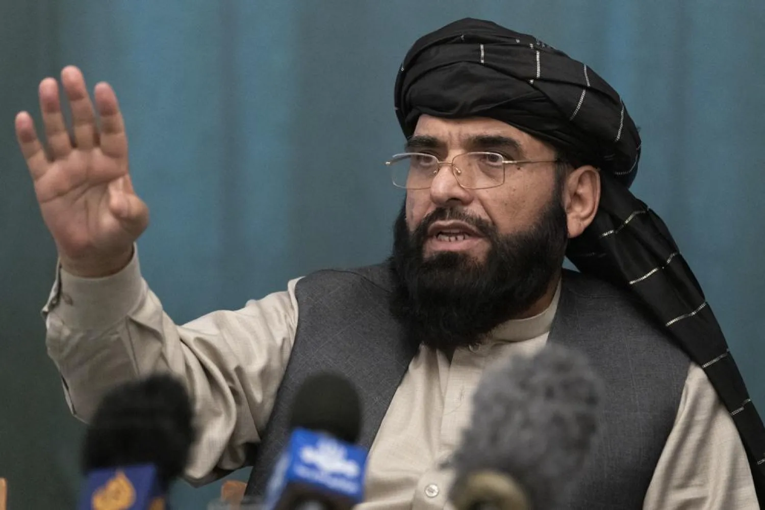 FILE - In this March 19, 2021 file photo, Suhail Shaheen, Afghan Taliban spokesman and a member of the negotiation team gestures while speaking during a joint news conference in Moscow, Russia. (AP Photo/Alexander Zemlianichenko, Pool, File)

