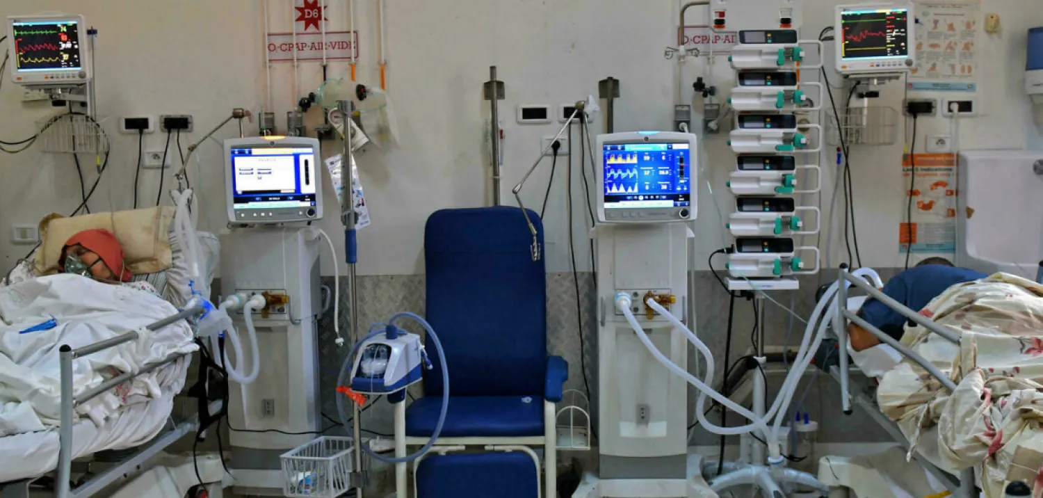 Patients with coronavirus patients lie intubated in an intensive care unit in Tunisia's coastal city of Sousse - AFP