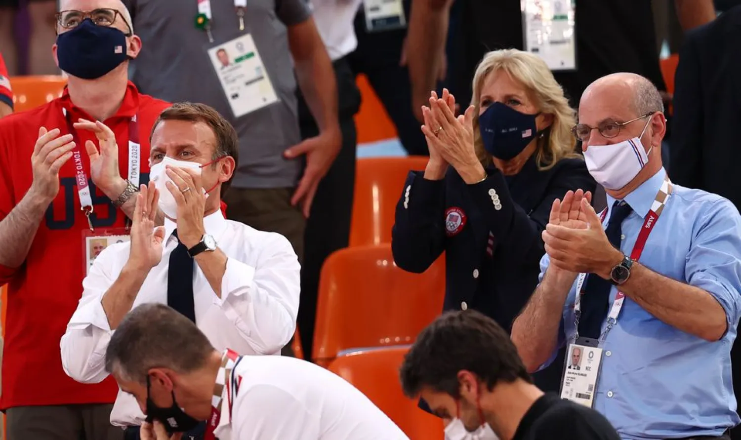 France President Emmanuel Macron and US First Lady Jill Biden applaud as they attend the match. (Reuters)
