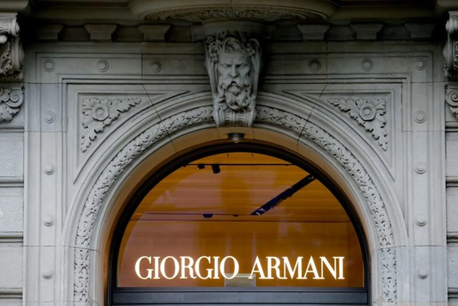 The logo of Italian fashion company Giorgio Armani is seen at a shop in Zurich, Switzerland July 8, 2021. (Reuters)
