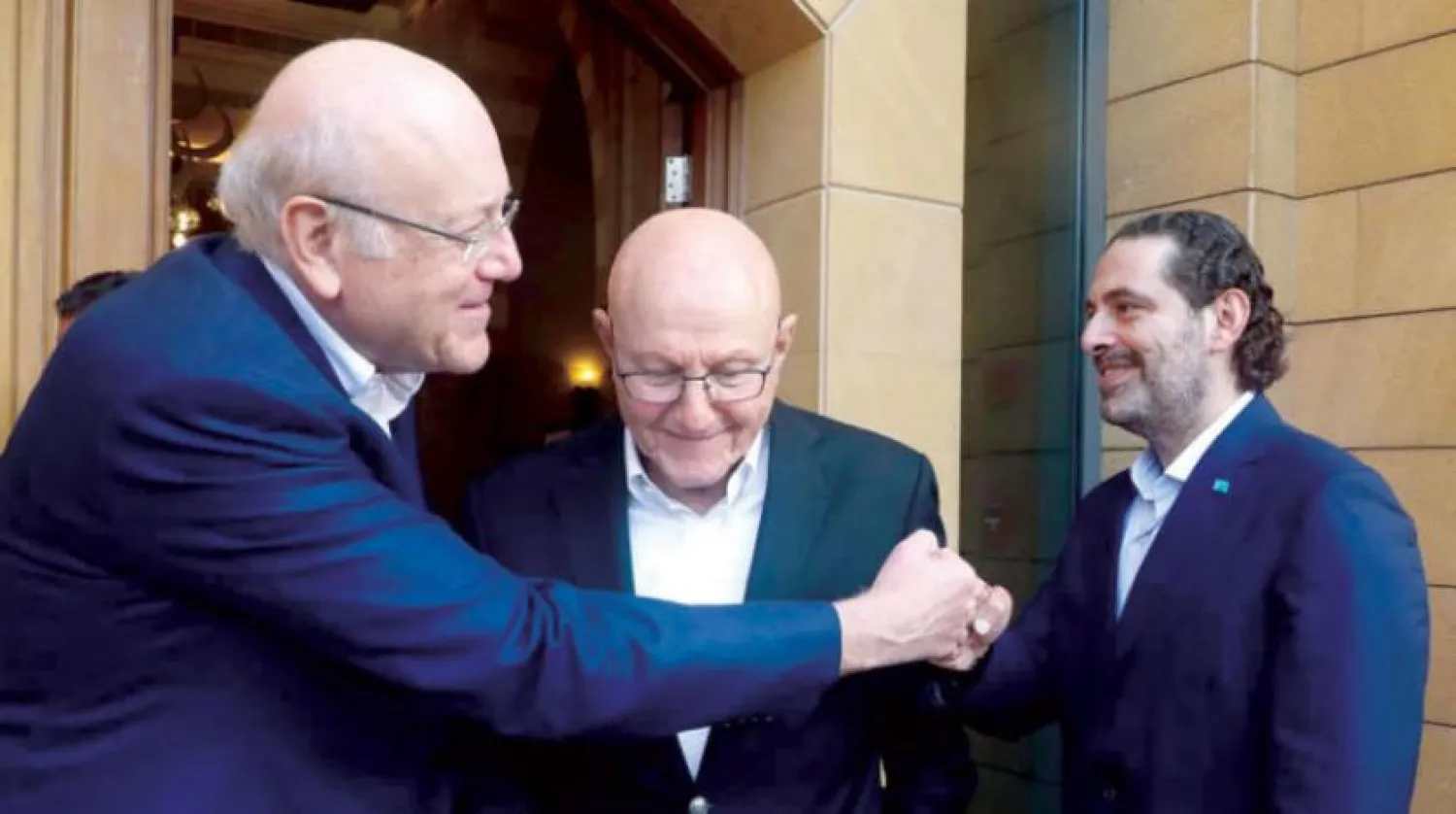 Hariri (R) and Mikati (L) after a meeting of former prime ministers on Sunday. (Hariri's press office)