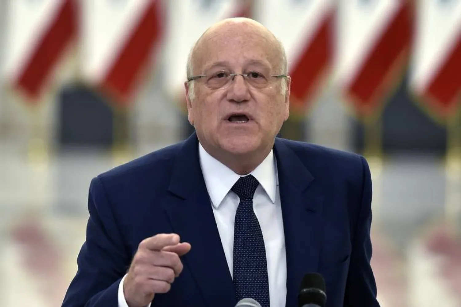 Prime Minister-designate Najib Mikati speaks to the media after meeting with President Aoun and designation to form a new government, at the presidential palace in Baabda, Lebanon, July 26, 2021. (EPA)
