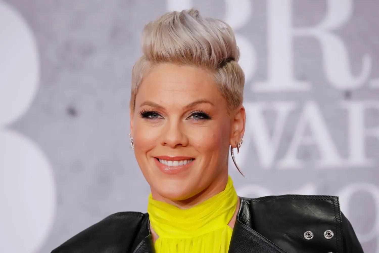 US singer-songwriter Pink poses on the red carpet on arrival for the BRIT Awards 2019 in London on February 20, 2019. (Photo by Tolga AKMEN / AFP)