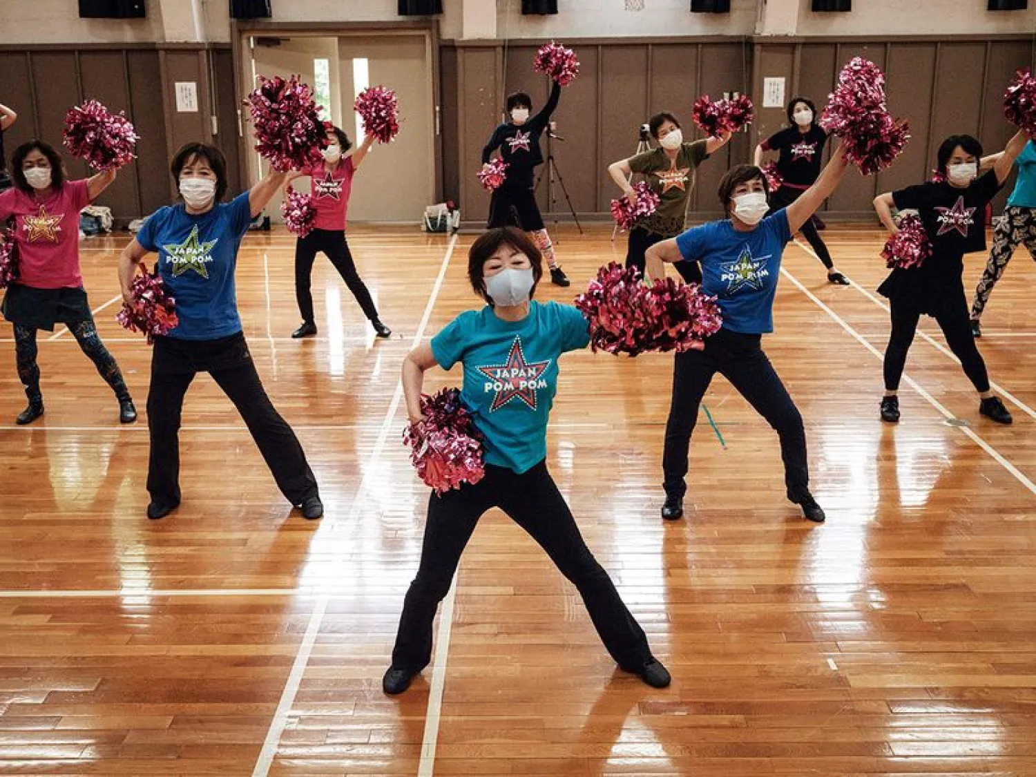 "Members suffer from leg or back pain, but they're working hard," Takino, who founded the senior cheerleading squad "Japan Pom Pom" when she was 64 years old, told AFP.
Image Credit: AFP