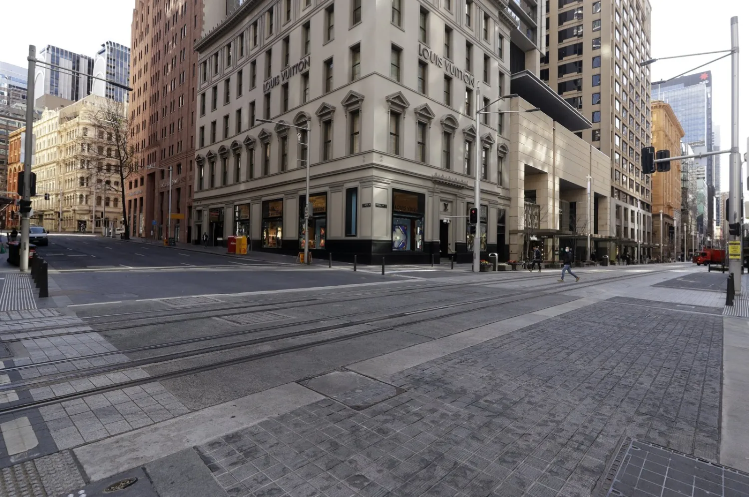 A normally busy shopping area in Sydney is nearly empty of people amid a two-week lockdown, Australia, July 7, 2021. (AP Photo)