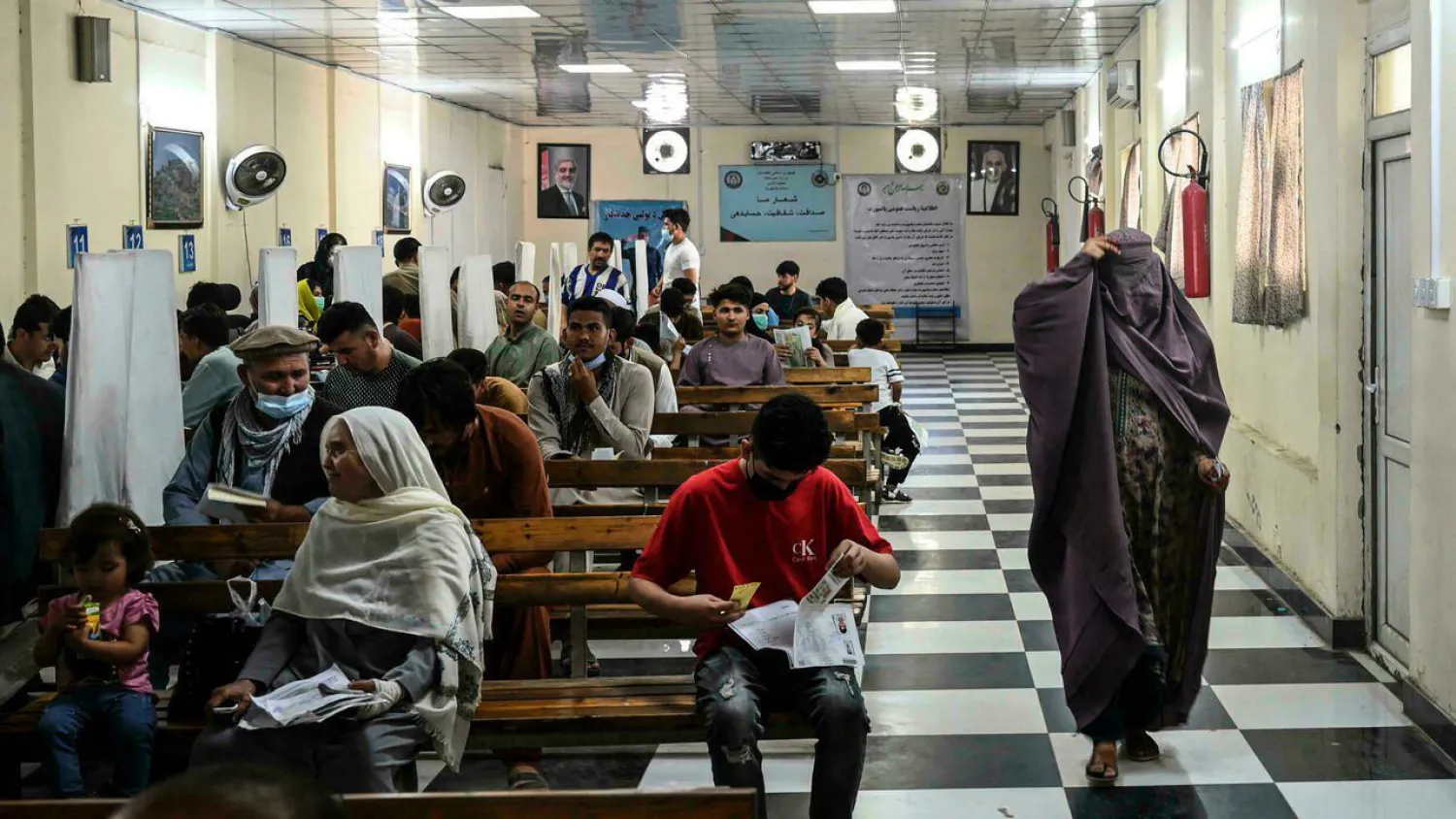 With the Taliban making huge advances in the countryside as foreign forces wind up their withdrawal, many Afghans -- those with the means, at least -- are looking for a way out. SAJJAD HUSSAIN AFP