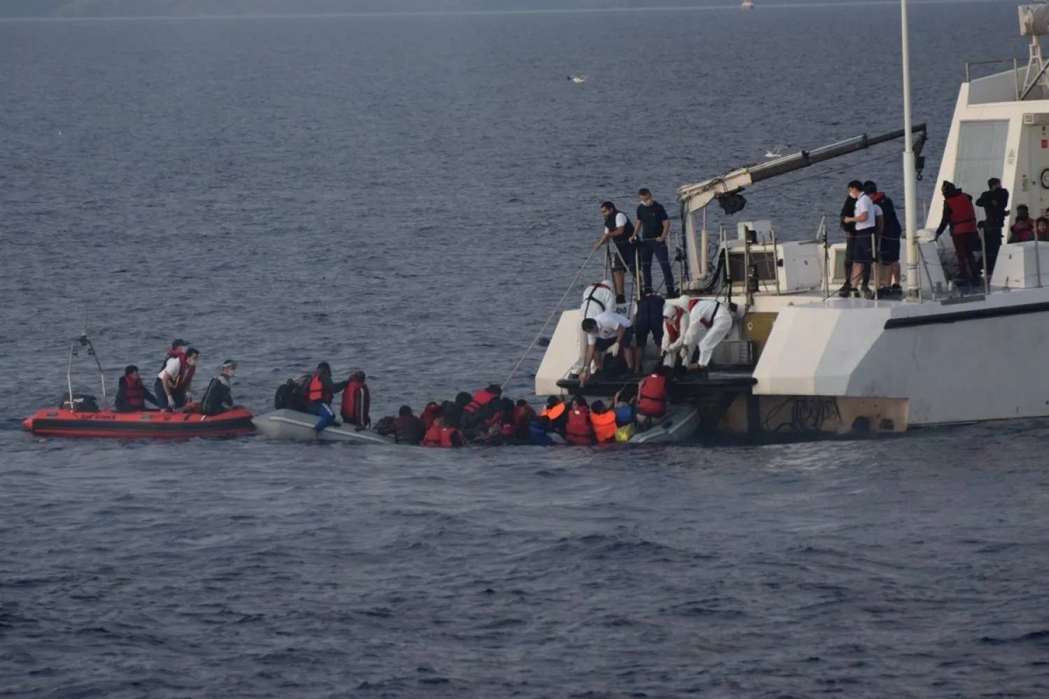 Turkish coast guard units rescue irregular migrants in the Aegean Sea, Turkey, June 15, 2020. (AA Photo)
