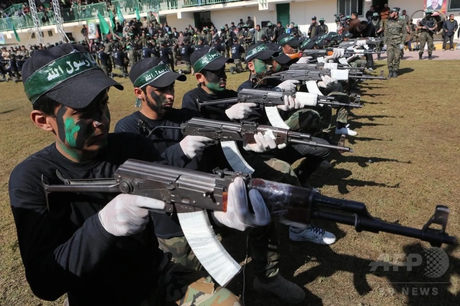 Palestinian youth show their skills during a Hamas graduation ceremony in Gaza. (AFP)