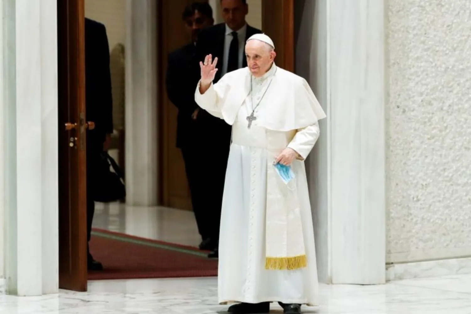 Pope Francis waves as he arrives at the Paul VI Hall for the weekly general audience at the Vatican, August 4, 2021. (Reuters)