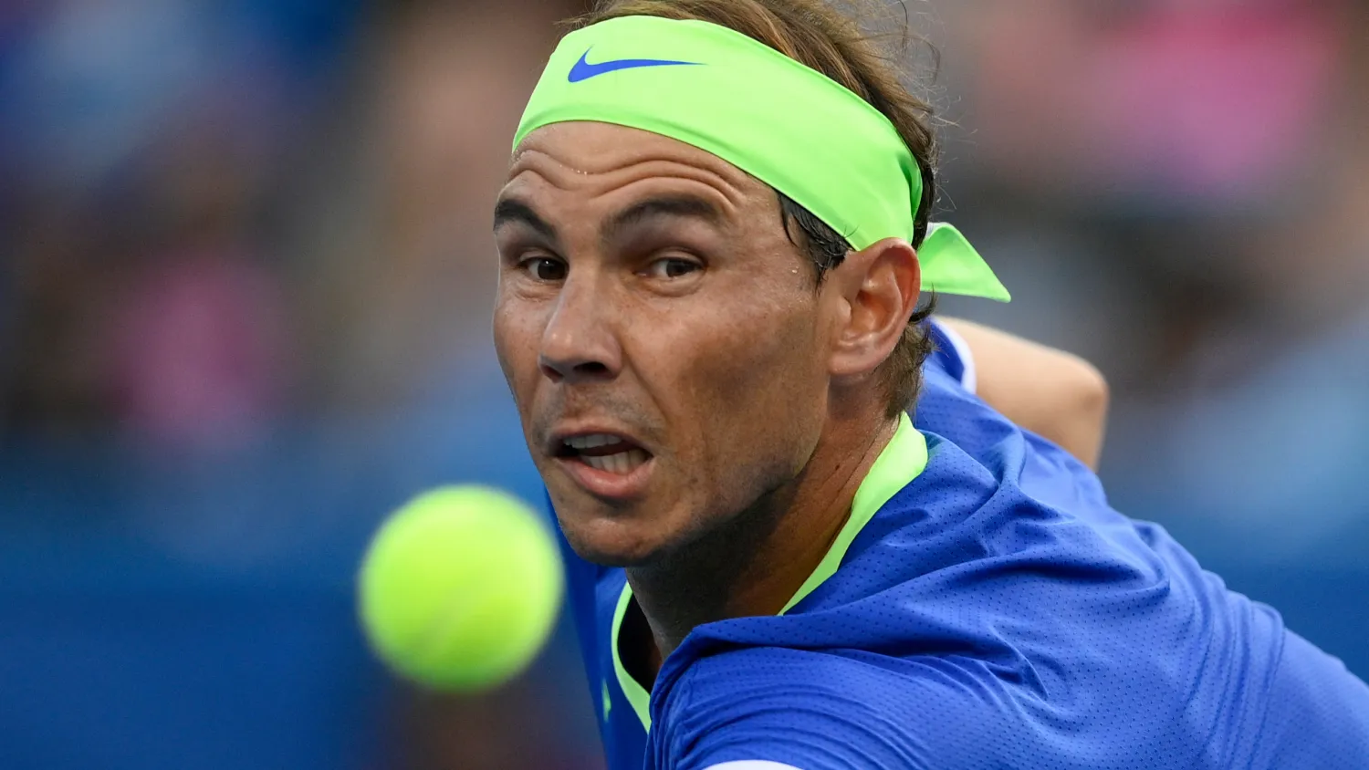 Rafael Nadal, of Spain, reaches for a shot from Jack Sock, of the United States, at the Citi Open tennis tournament Wednesday, Aug. 4, 2021, in Washington. (AP Photo/Nick Wass)
