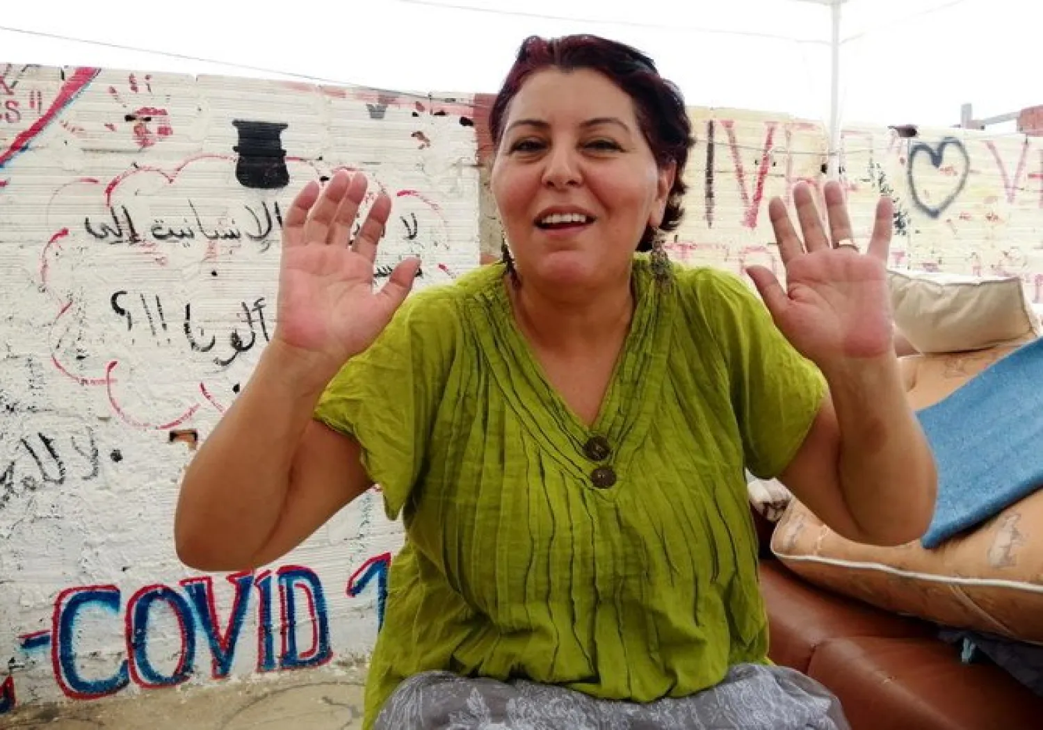 Fatma Jgham, 48-year old art teacher and political activist, attends an interview with Reuters in Tunis. (Reuters)
