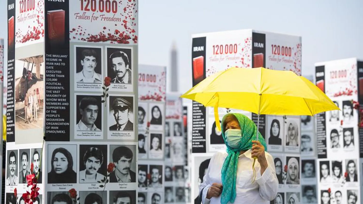Photos of some of the thousands of people killed in Iran in 1988 on display in Washington last year SAUL LOEB AFP/File
