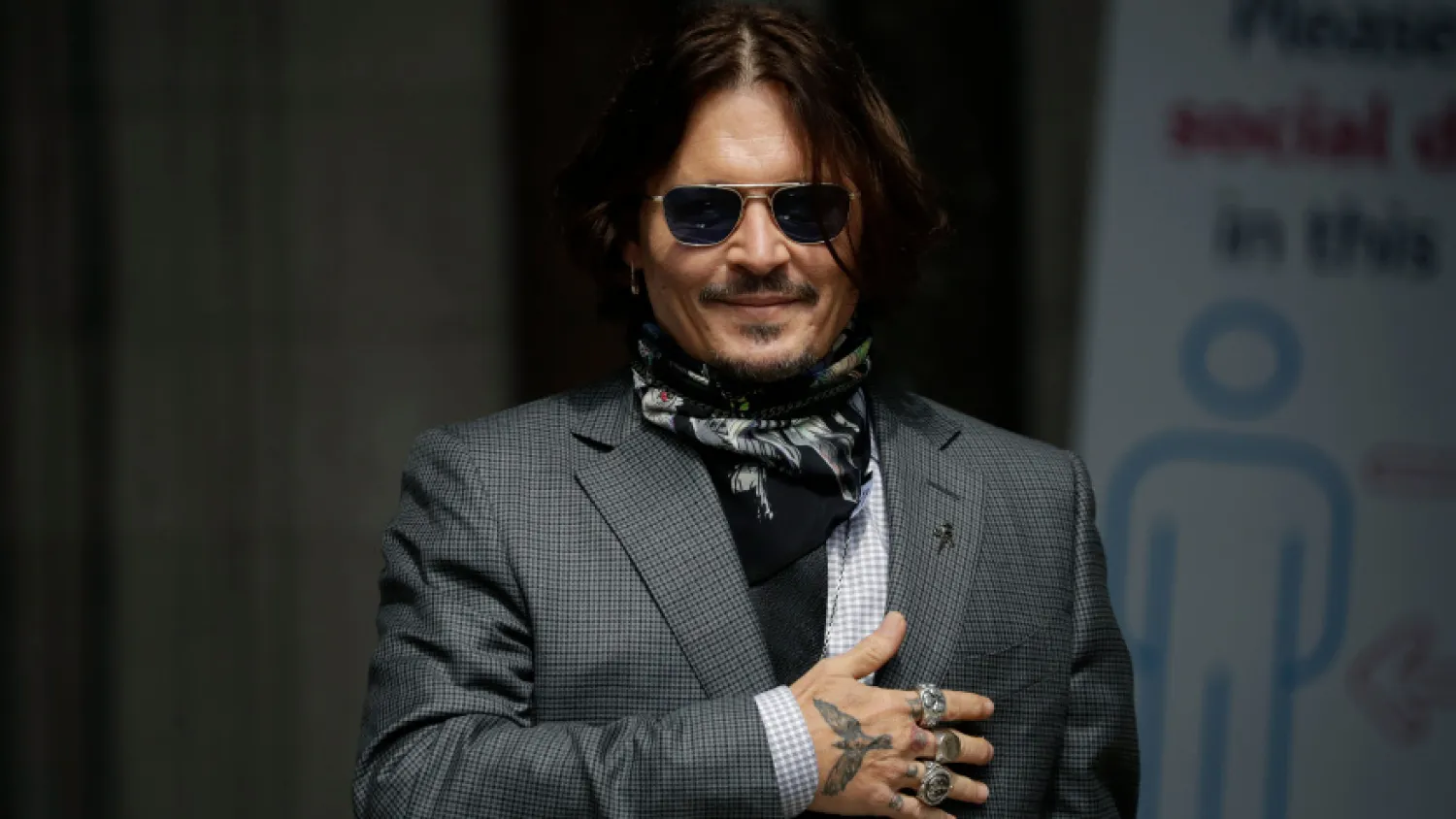 FILE – In this Thursday, July 23, 2020 file photo, US actor Johnny Depp gestures to fans and the media as he arrives at the High Court in London. (AP Photo/Matt Dunham, file)

