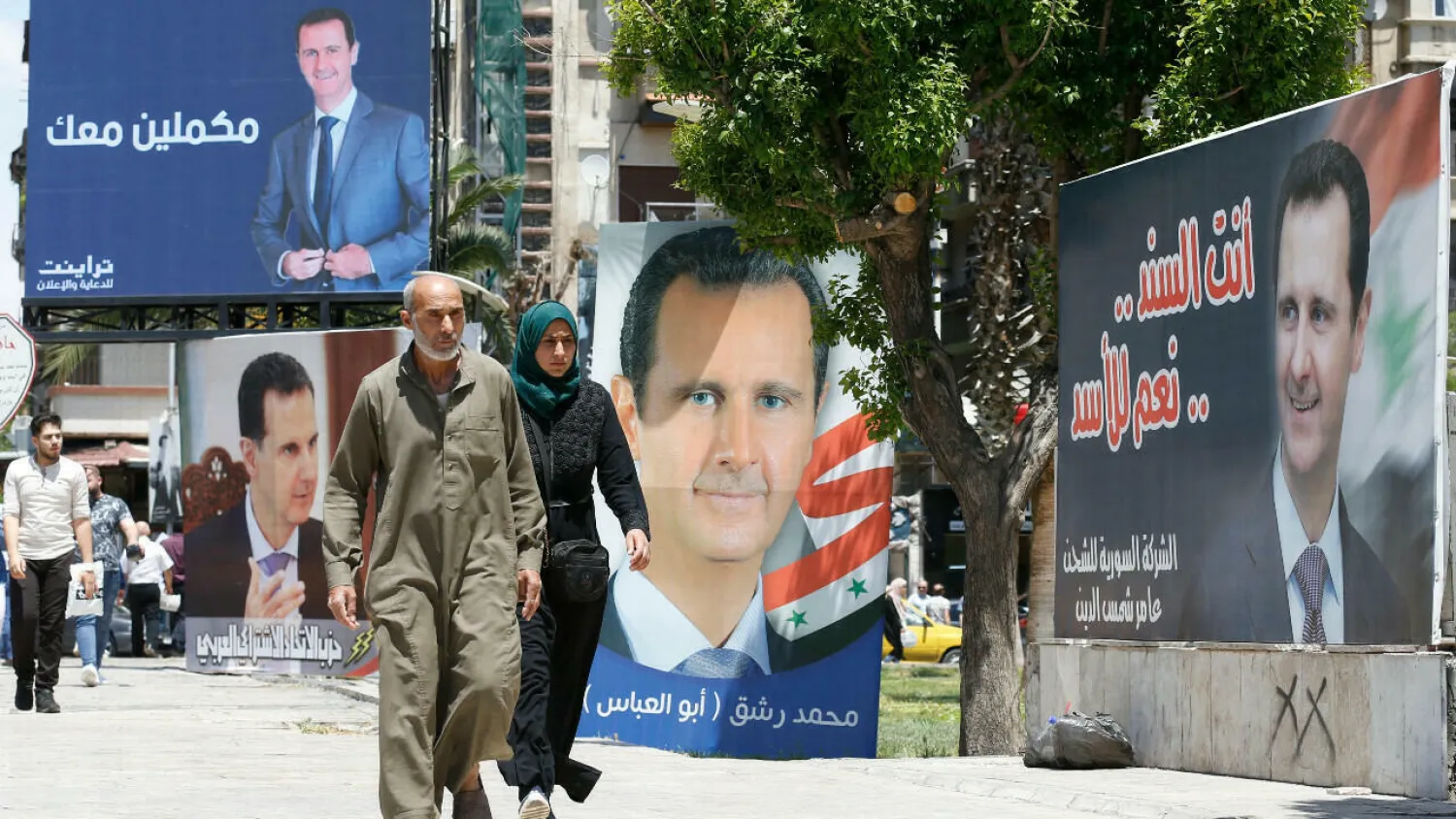 Syrian President Bashar Assad appointed a new government, leaving most key posts unchanged. (AFP)
