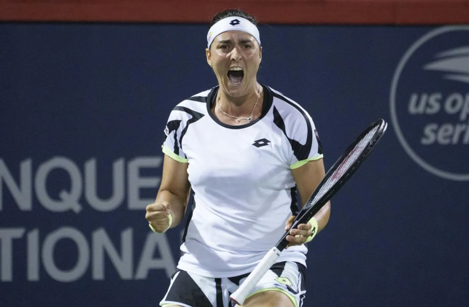 Ons Jabeur celebrates after winning the second set over Bianca Andreescu during the National Bank Open women’s tennis tournament Thursday, Aug. 12, 2021, in Montreal. (AP)