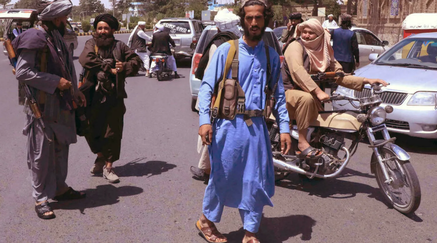 Taliban fighters patrol the streets in Herat on August 14, 2021. © AFP

