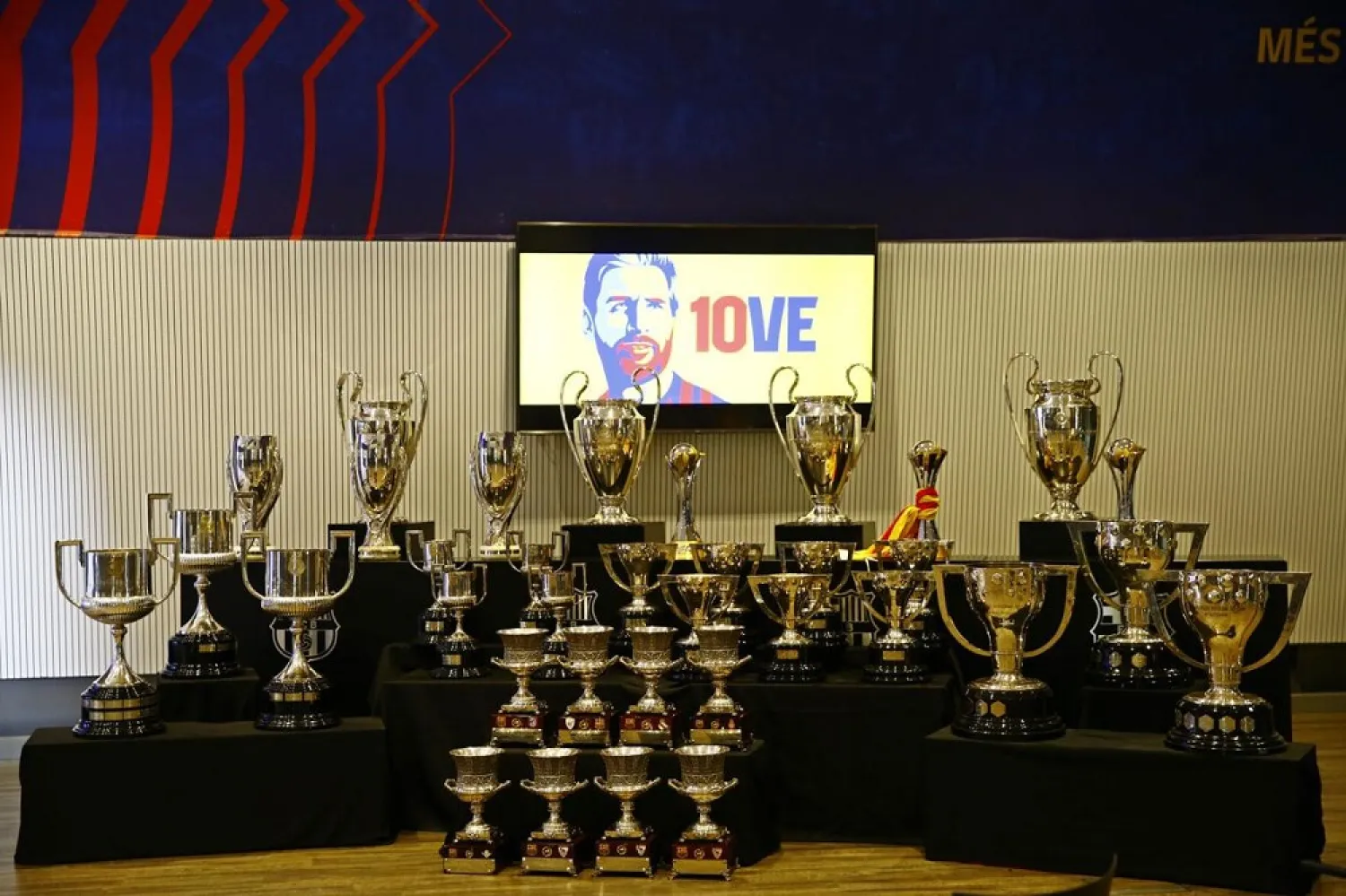 Trophies of the titles Messi has won during his time at Barcelona. (AP)