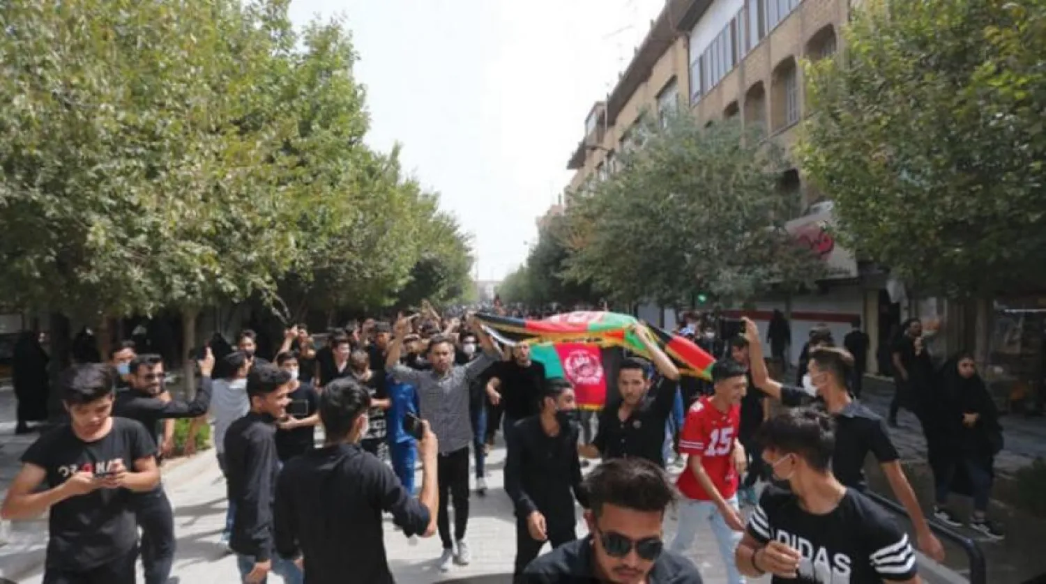  Afghans participate in a protest march against the “Taliban” in the Iranian city of Qom (Shafaqna)