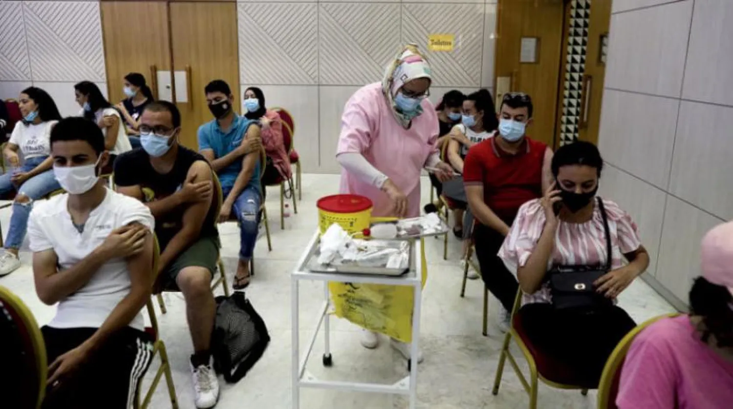 People at a vaccination center in Tunisia on Sunday. (EPA)