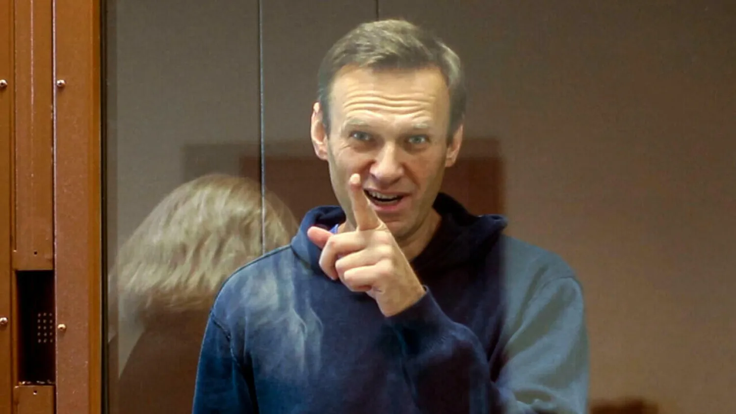 Russian opposition leader Alexei Navalny gestures during a hearing on his charges for defamation in the Babuskinsky District Court in Moscow on February 16, 2021. (AP)