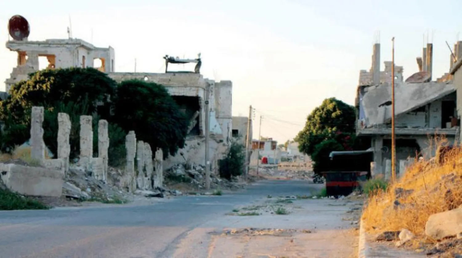 Dera el-Beled, çatışmalar nedeniyle yıkıma sahne oldu. (AFP)