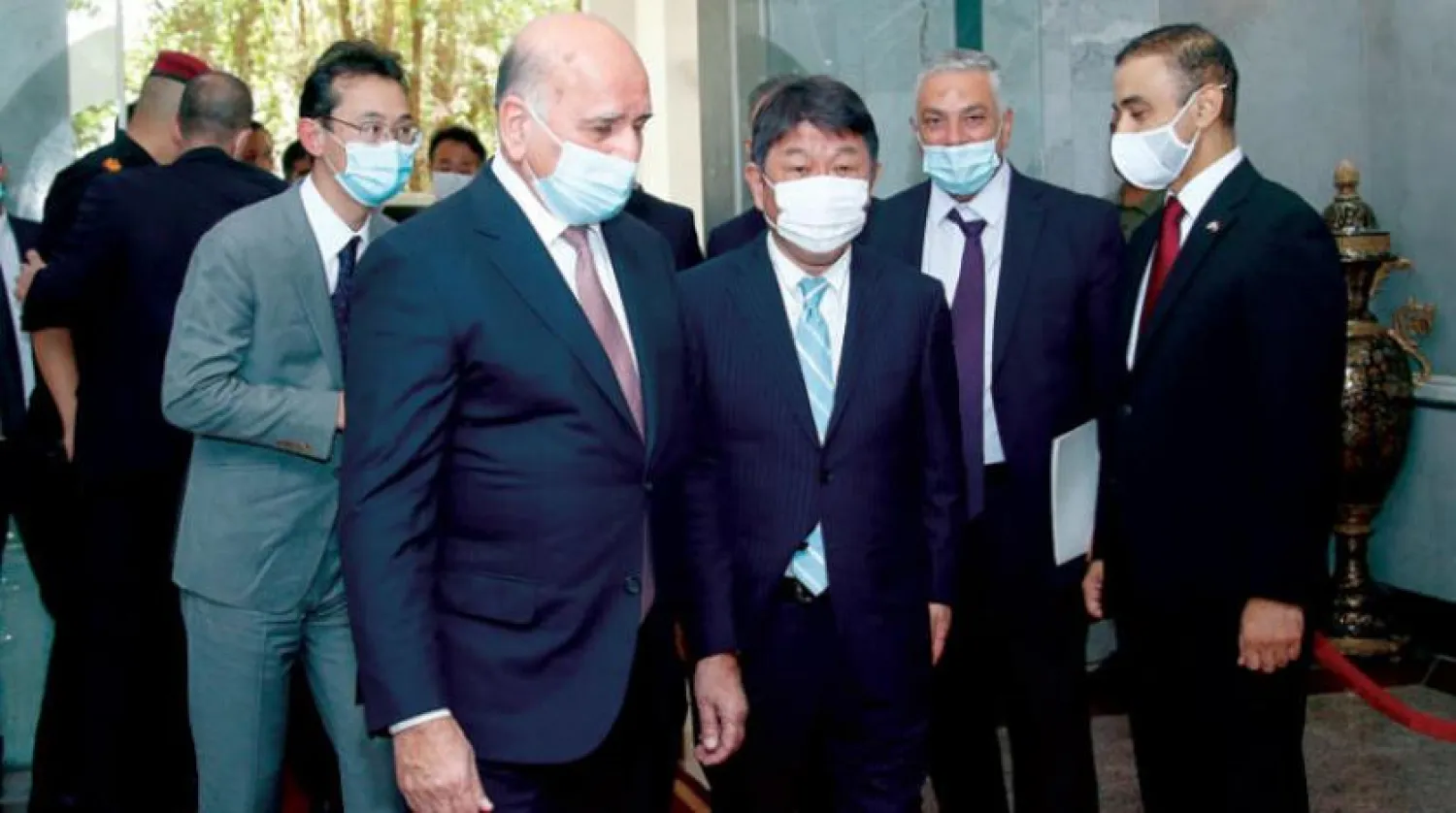 Irak Dışişleri Bakanı Fuad Hüseyin, dün Bağdat'ta Japon mevkidaşı Toshimitsu Motegi'yi kabul etti (AP)