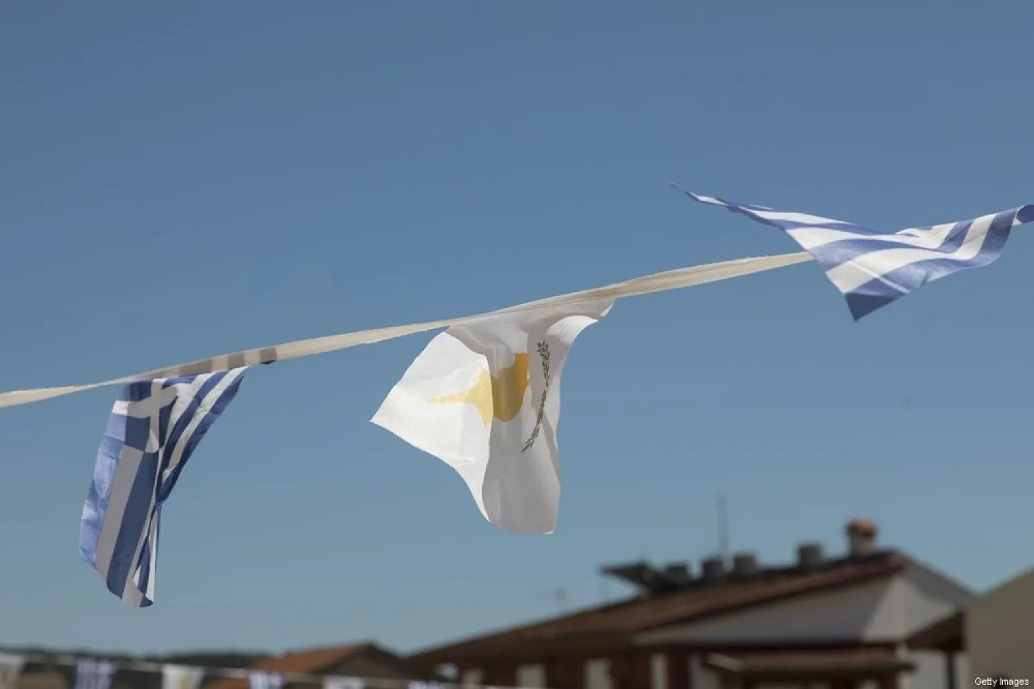 Greek and Cypriot flag at Omodos village on April 4, 2018 in Limassol, Cyprus. (Getty Images)