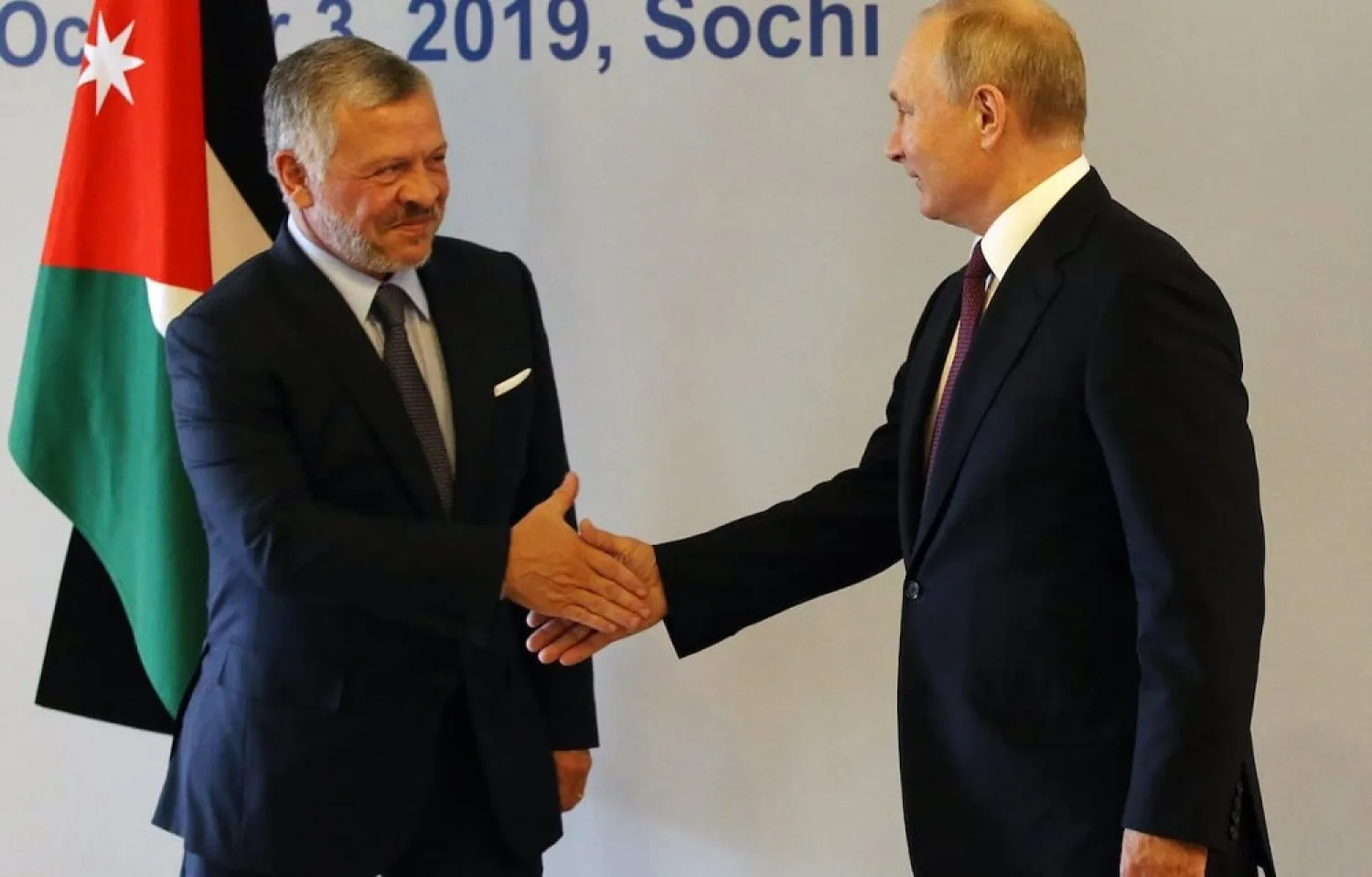 King of Jordan Abdullah II (L) and Russian President Vladimir Putin (R) shake hands during the Annual Meeting of Valdai International Discussion Club in Sochi, Russia, October 3, 2019. (Getty Images)